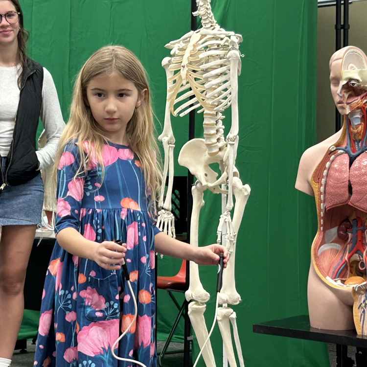 Image Description for Accessibility/ student with skeleton