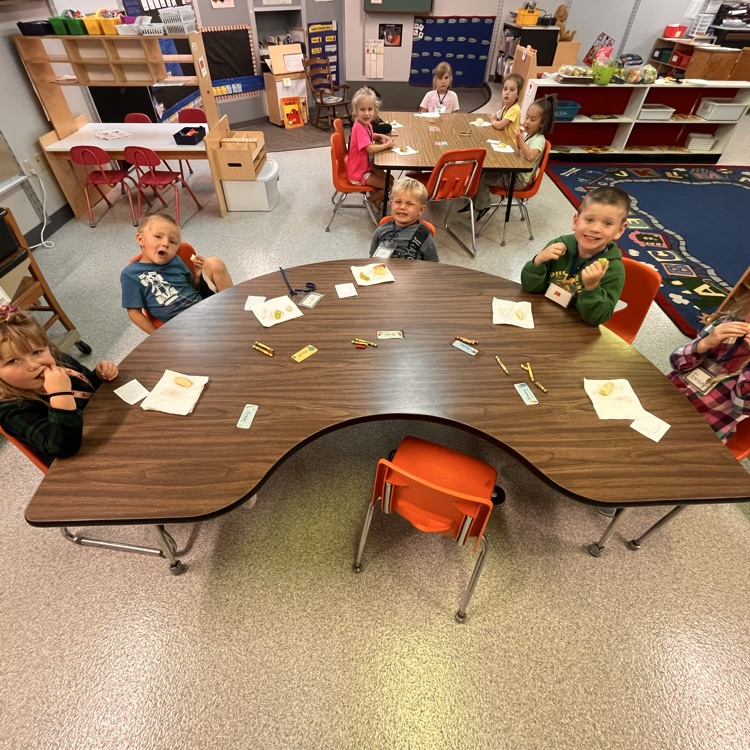 Image description for accessibility. students working at table