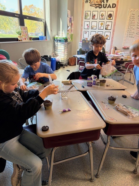 Image Description for accessibility:  Students making a snack in classroom