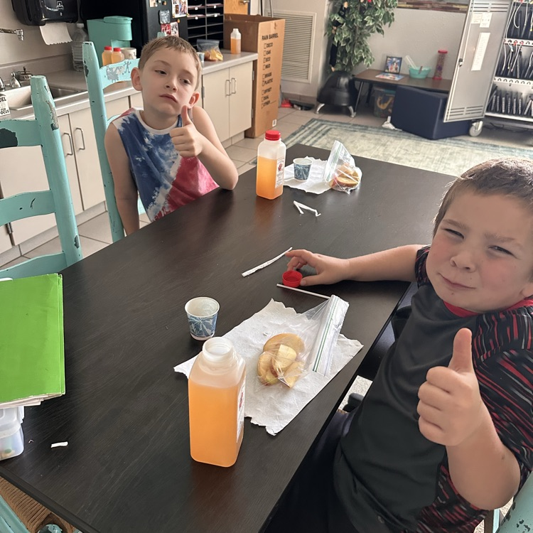 Image description for accessibility students eating apples