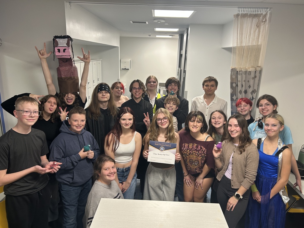 Image Description for accessibility:  Cast of OFSD play posing with certificate 