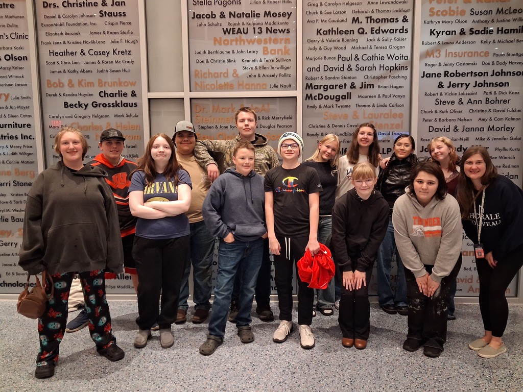 Image Description for Accessibility: Group of students posing for photo