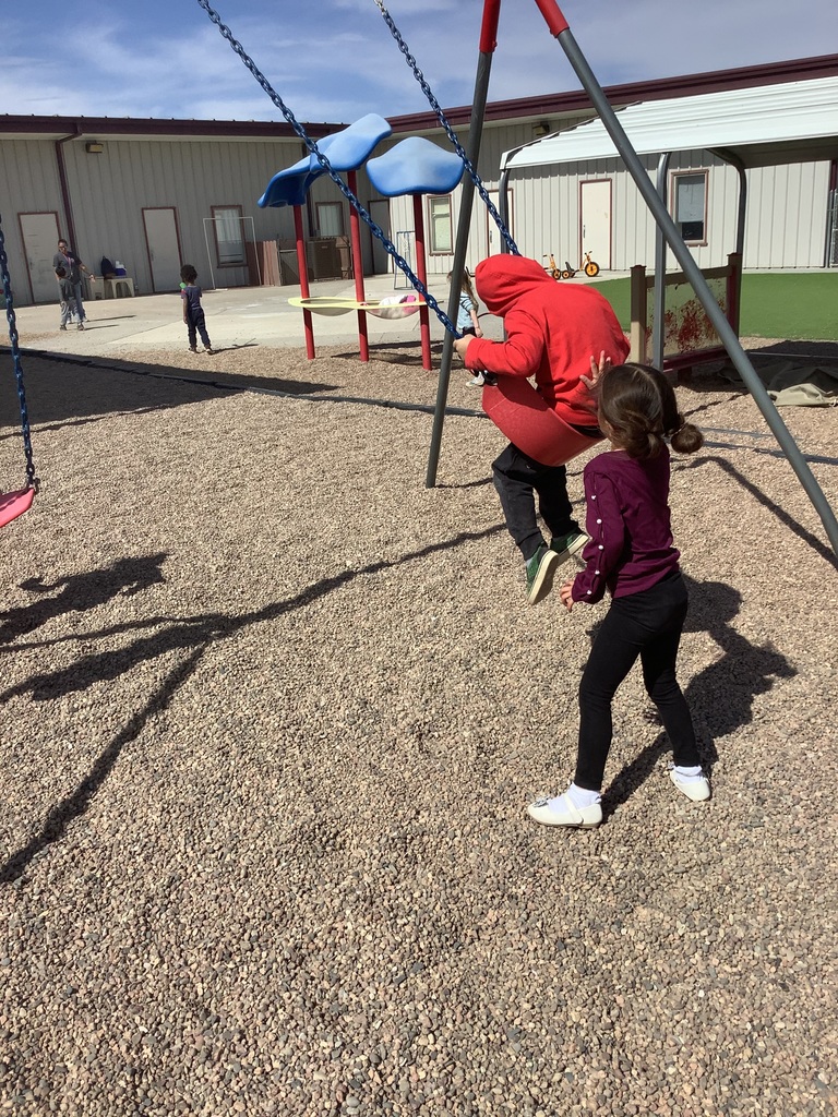 working together on the swings 