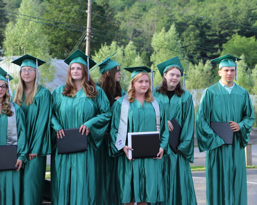 Students gathered outside after receiving their certificates.