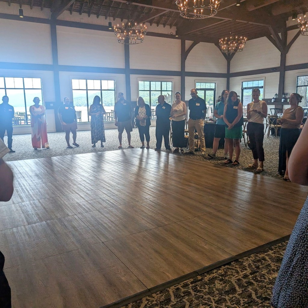 Group of people standing in a square
