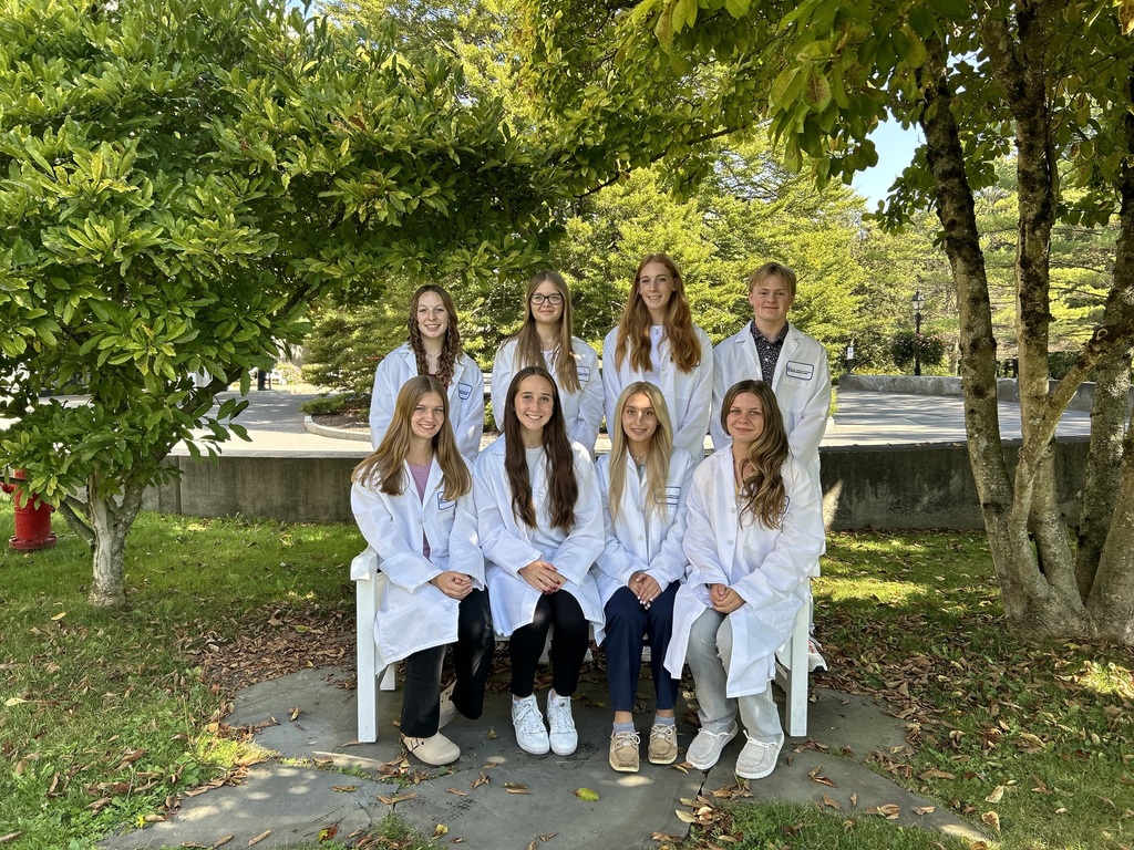 8 students gathered for a picture at Bassett Hospital in Cooperstown
