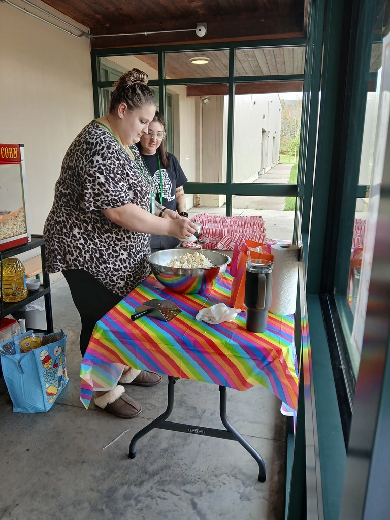Staff making popcorn.