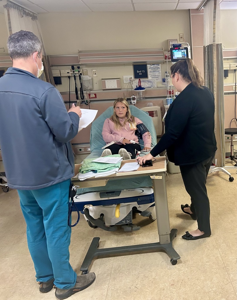 Two staff members inside the hospital and a student acting as a victim during the drill.