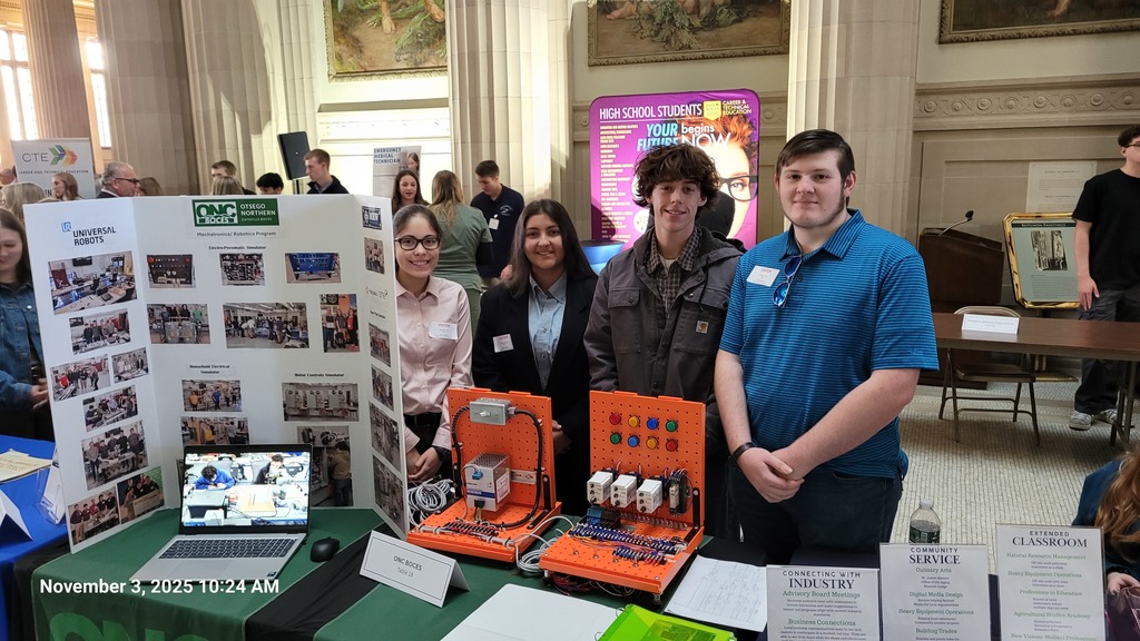 Four Mechatronics students at their table