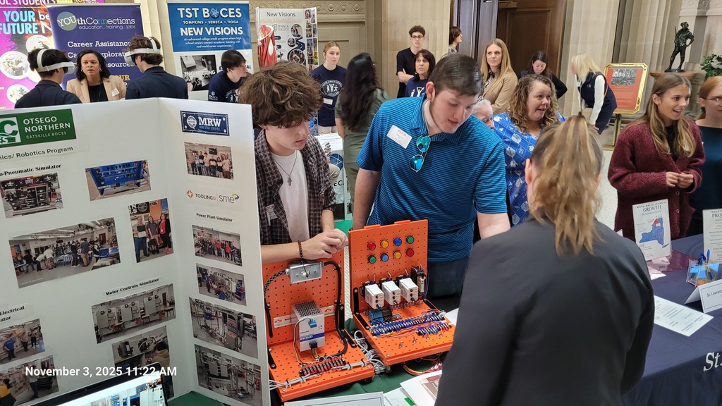 Mechatronics student demonstrating to other students
