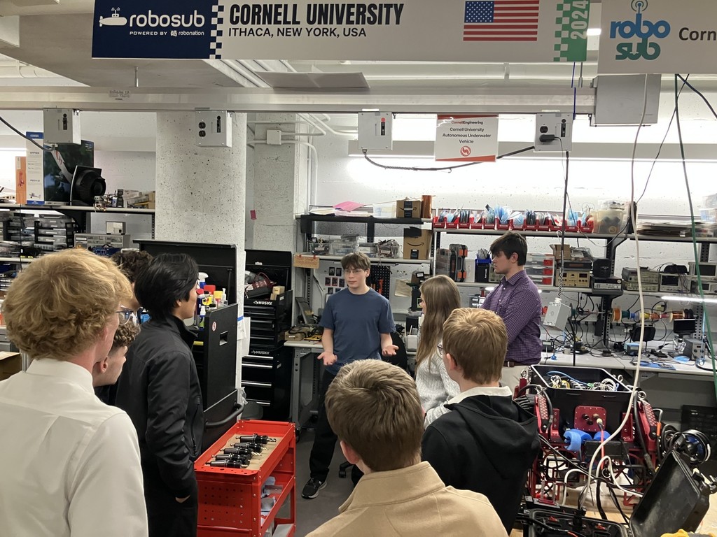 Students listening to a presentation about the Cornell robosub