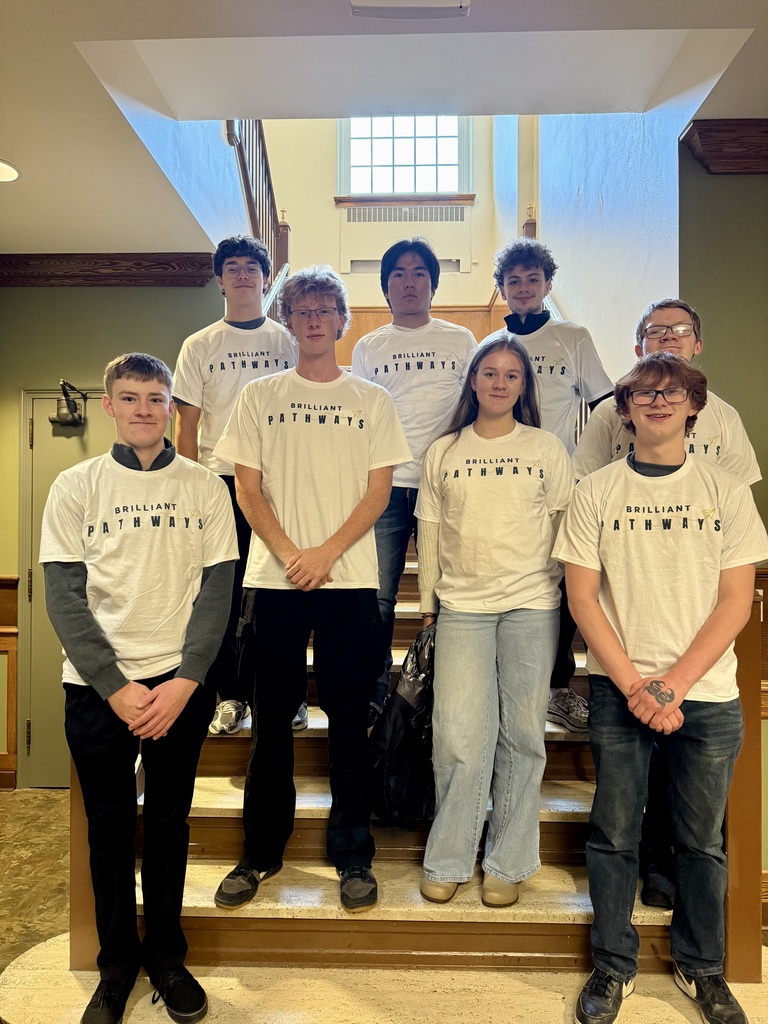 8 students at SUNY Oneonta with Brilliant Pathways tee shirts on.