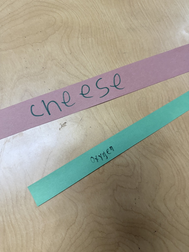 Two parts of the gratitude chain: one says cheese and the other says oxygen