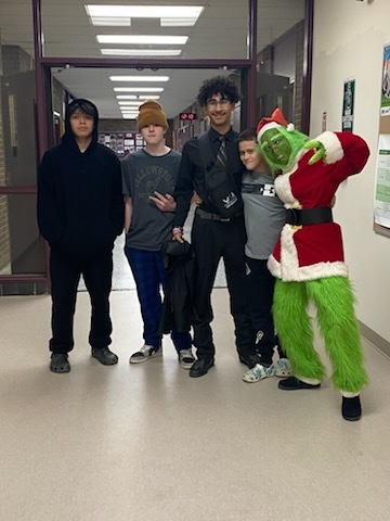 The Grinch with four students