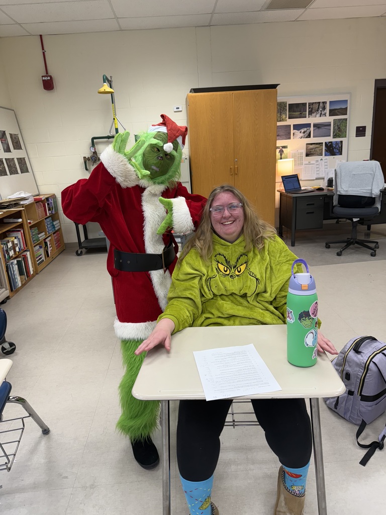 THe Grinch with a student