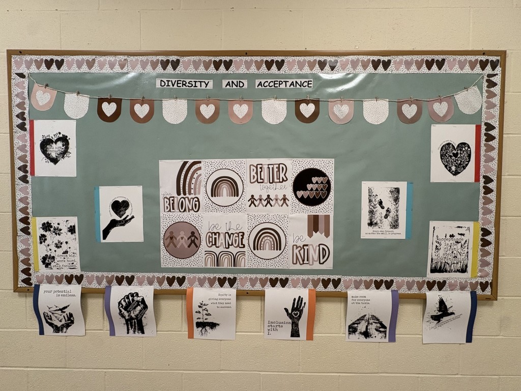 A bulletin board that says Diversity and Acceptance. Belong Change Better Kind