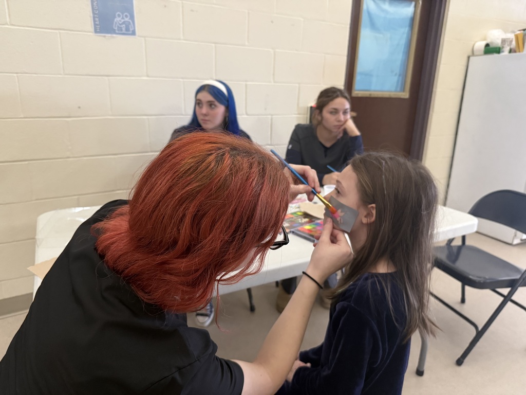 Student getting face painted