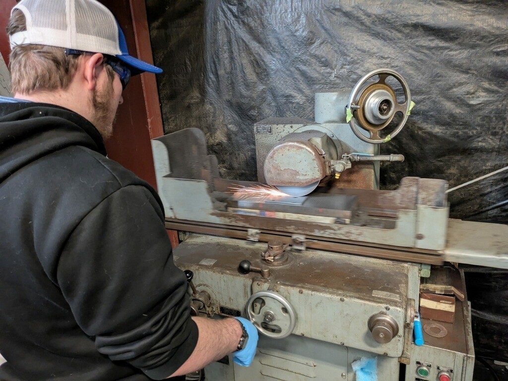 Student working on machinery.