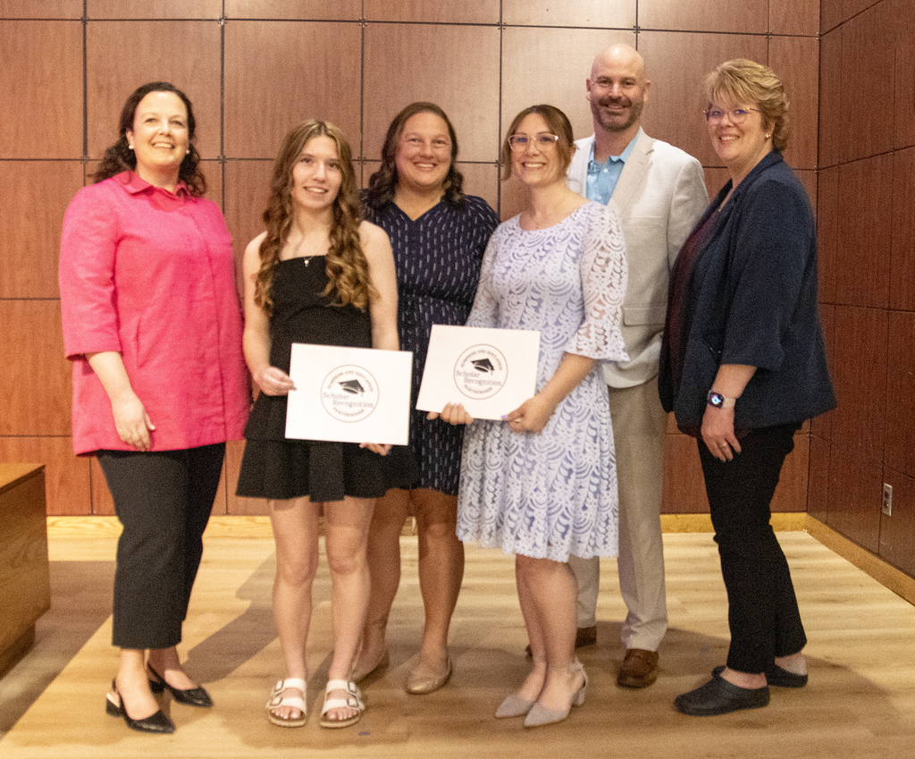 ONC BOCES District Superintendent, cosmetology student, OAOC building principal, cosmetology instructor, ONC Assistant Superintendent for Student Services and ONC Director of Student Programs posing. Student and instructor are holding their certificates.