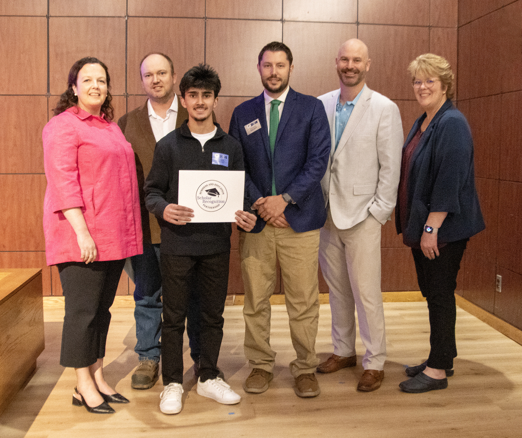 ONC BOCES District Superintendent, welding student, NCOC building principal, welding instructor, ONC Assistant Superintendent for Student Services and ONC Director of Student Programs posing. Student is  holding their certificates.