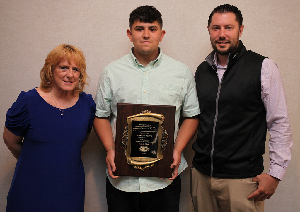 NCOC building counselor, Kris Ferrell, Student holding a plaque, and Jesse Bright, NCOC building principal