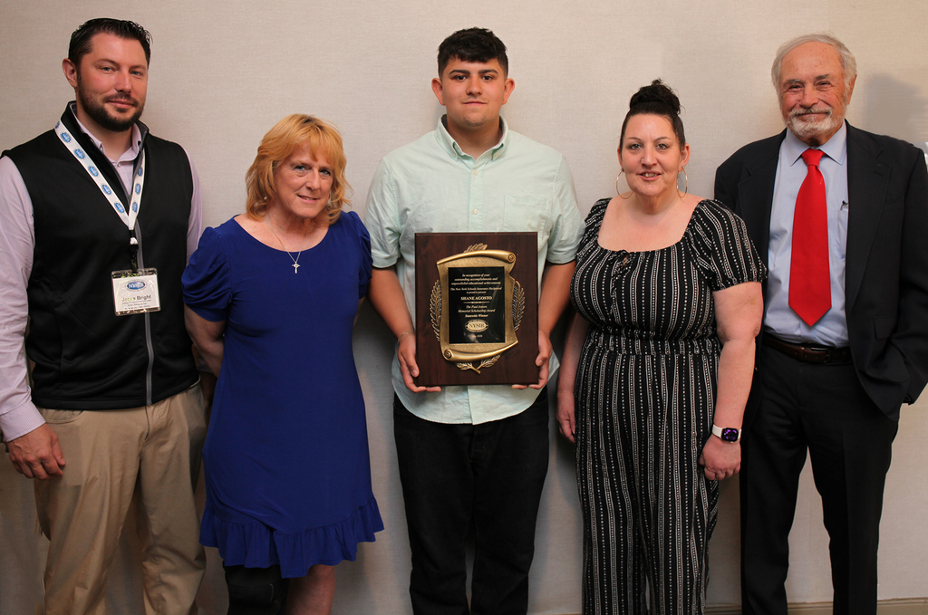 NCOC building principal, Jesse Bright,  NCOC building counselor, Kris Ferrell, student holding a plaque, student's mother,  scholarship representative