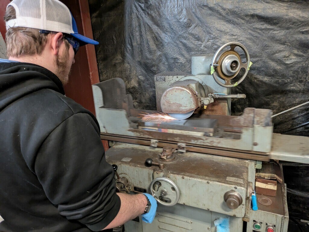 Student working with a machine inside