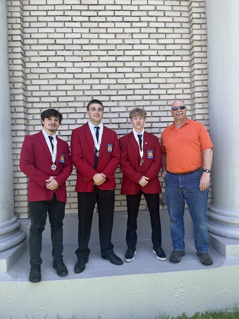 3 students with teacher outside