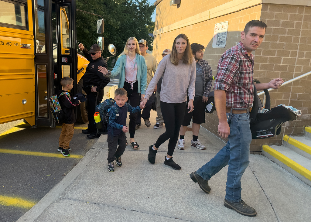 Family arriving with students