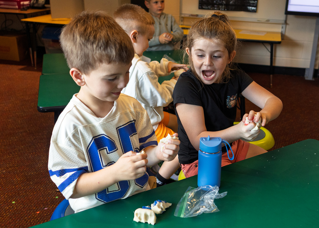 Students noticing the playdough is changing color