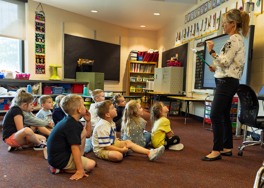 The class listening to Ms. Davis explain her magic and magic want