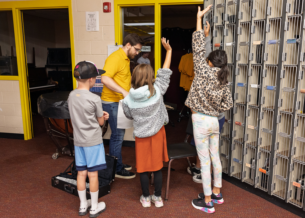 Students raising their hands