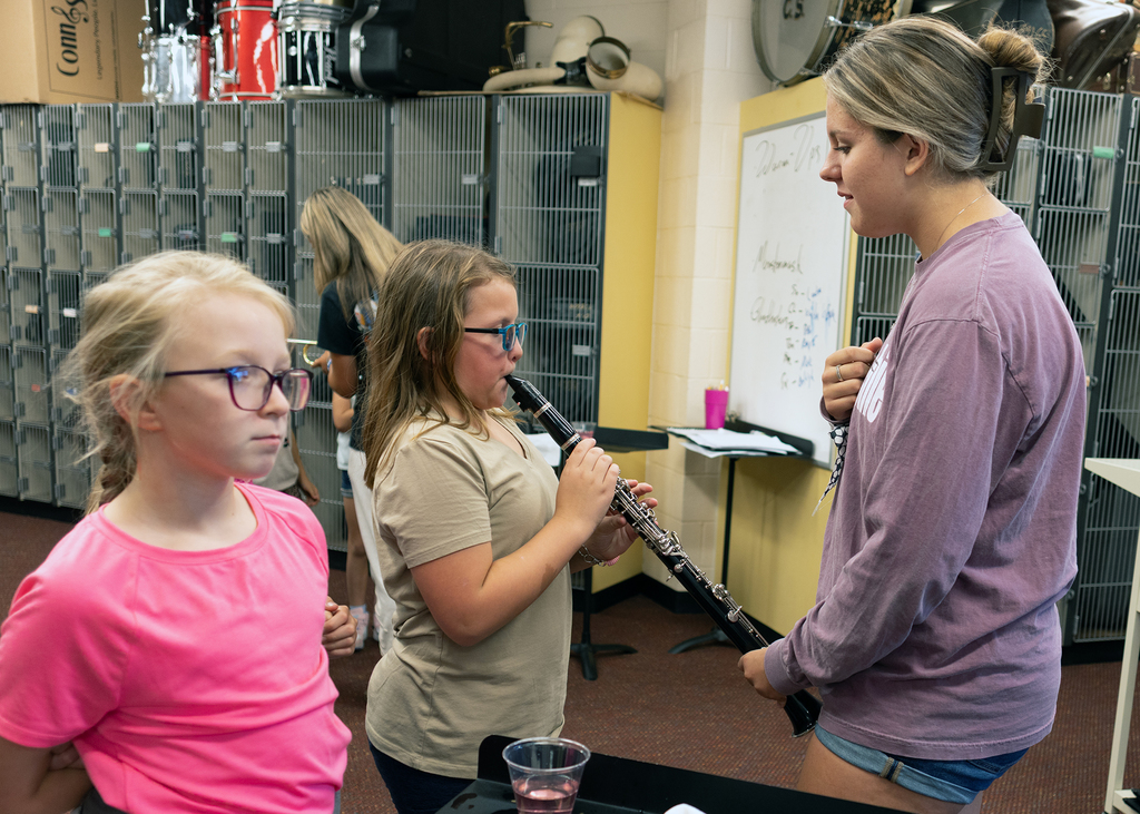 A student trying the clarinet