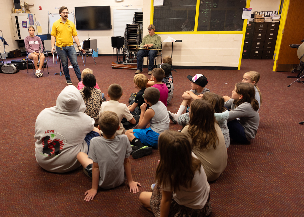 Students listening to Mr. Taylor