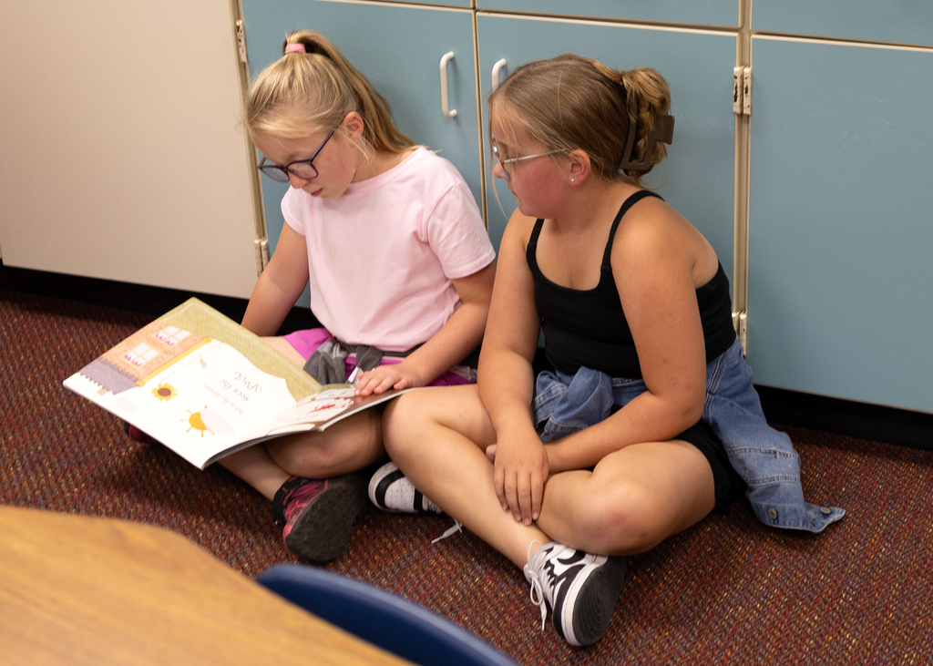 3rd and 4th graders practice reading