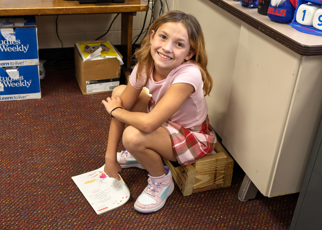 3rd and 4th graders practice reading