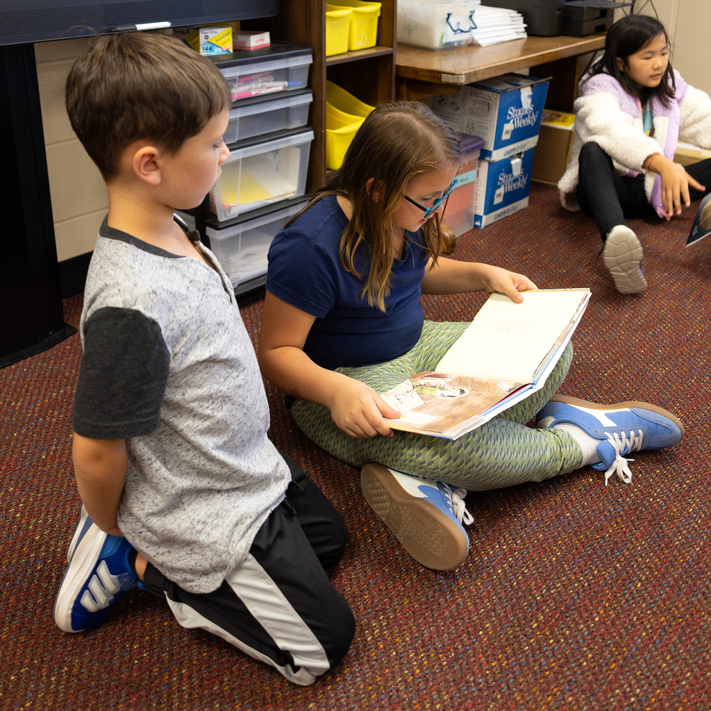 3rd and 4th graders practice reading