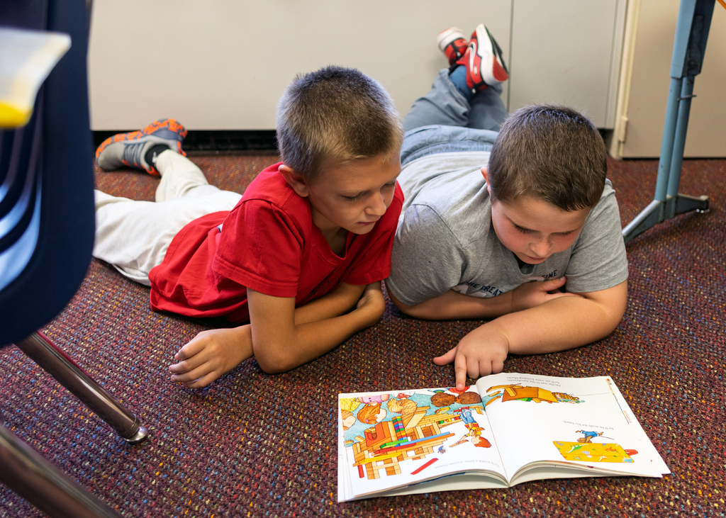 3rd and 4th graders practice reading