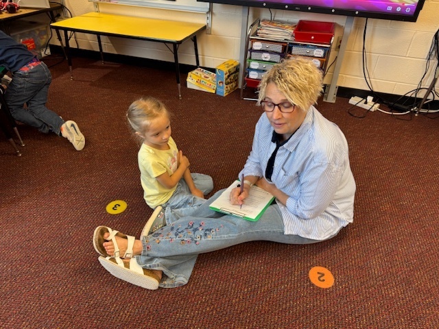 Mrs. Youngs  interview a kindergartener for new newsletter