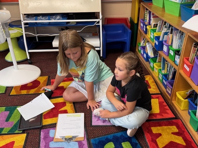 5th graders interview kindergarteners for new newsletter