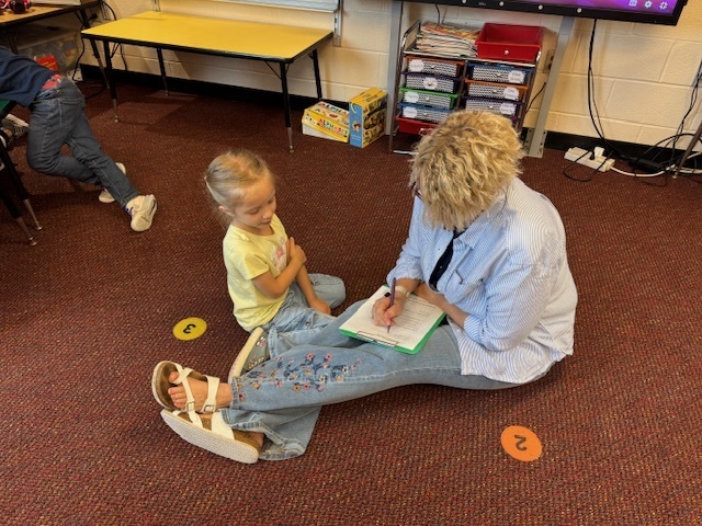 Mrs. Youngs  interview a kindergartener for new newsletter