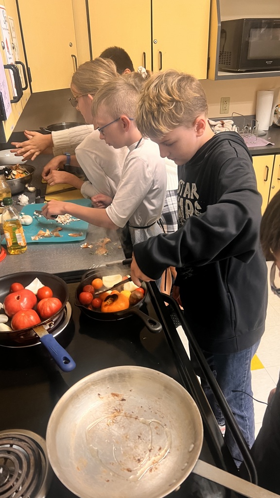 Students cooking in 5A