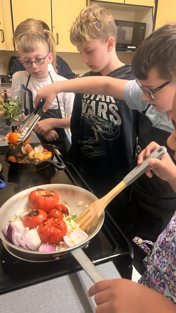 Students cooking in 5A