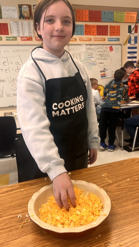 Students cooking in 5A