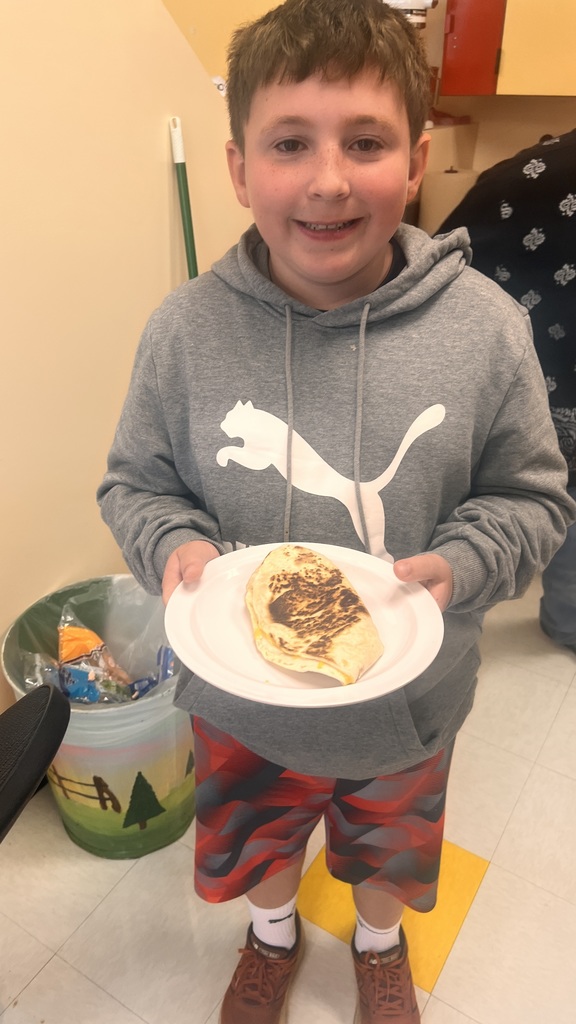 Students cooking in 5B