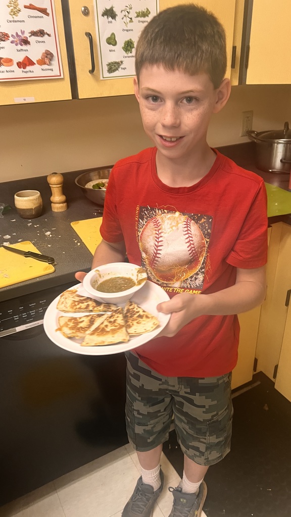 Students cooking in 5B