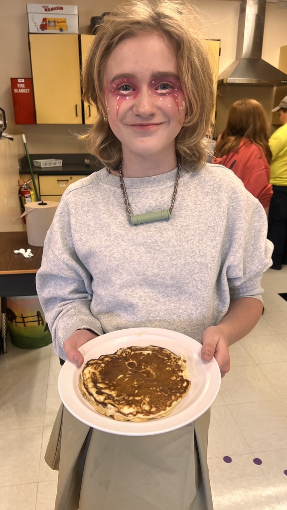 6th grade cooking class makes fluffy pancakes
