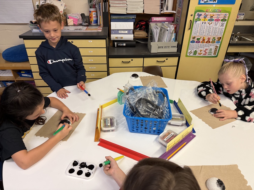 First graders building spiders during OT time and having a blast!