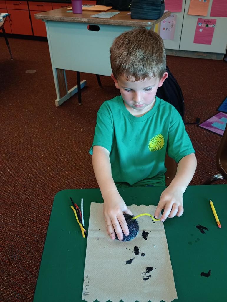 Kindergarteners making spiders!