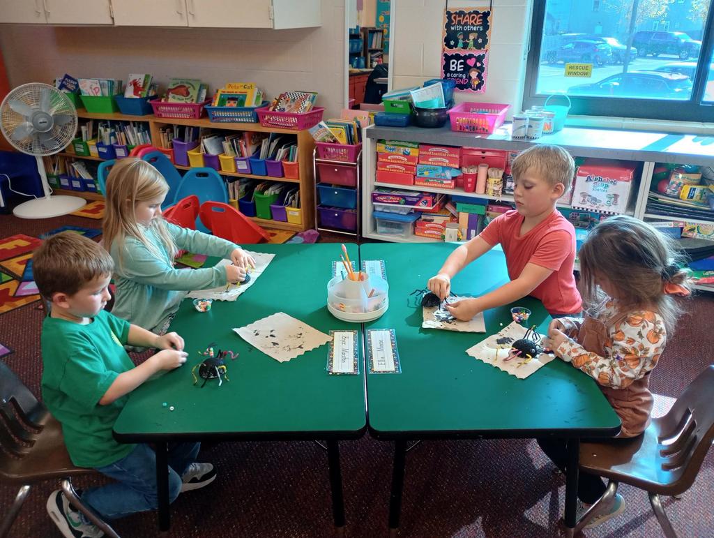 Kindergarteners making spiders!